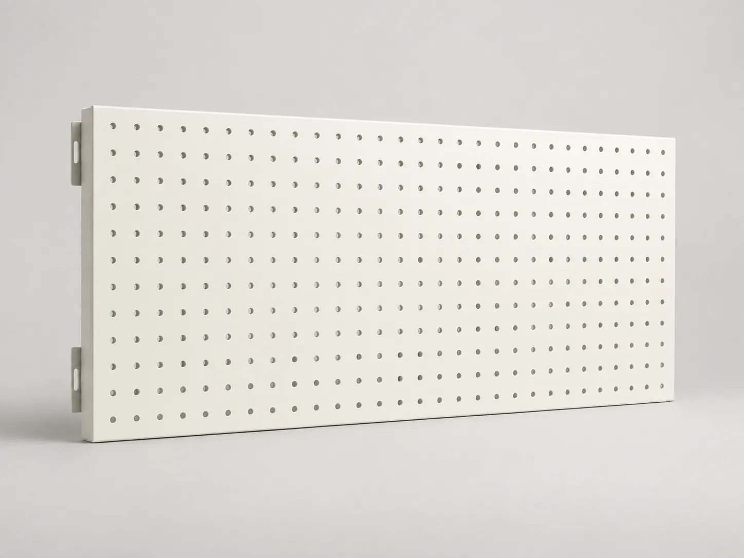 Empty white horizontal pegboard panel